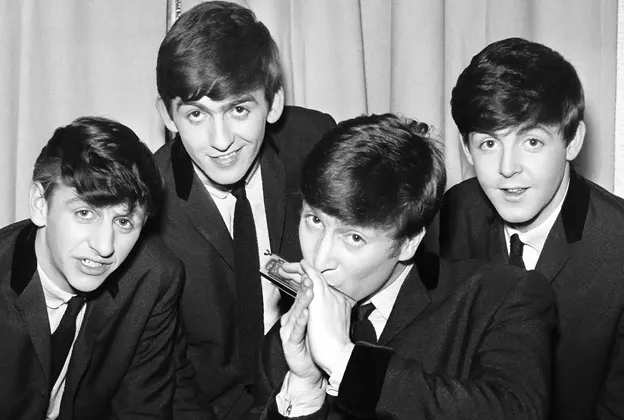 The Beatles around the time they released 'Love Me Do.' Original source: Getty Images, www.rollingstone.com/music/music-news/50-years-ago-today-the-beatles-released-their-debut-single-love-me-do-97574/.